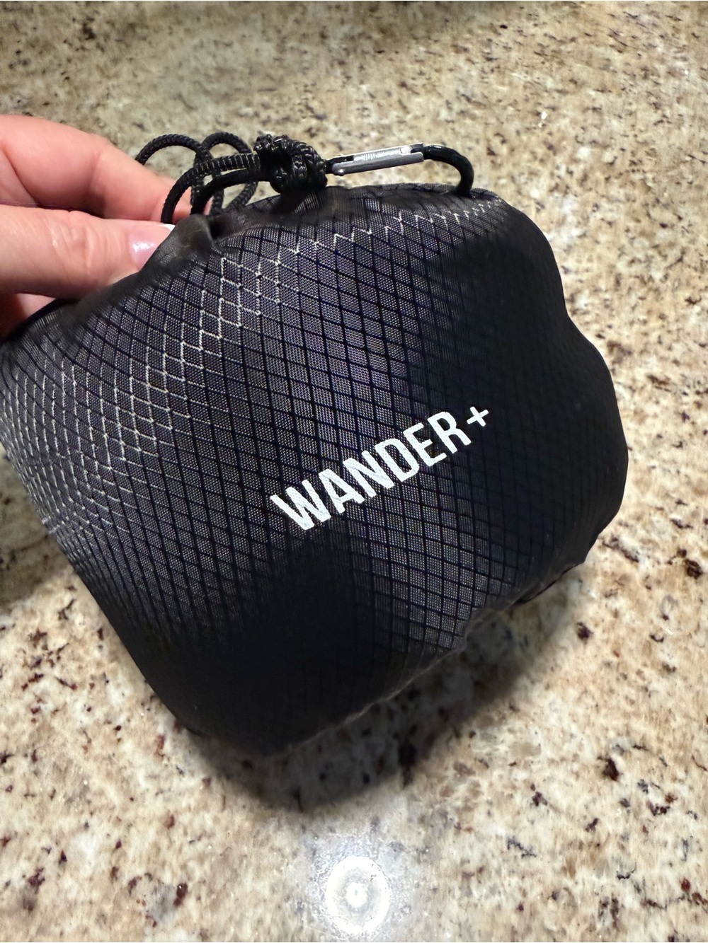 Wander+ Black Packable Travel Pouch with White Logo
